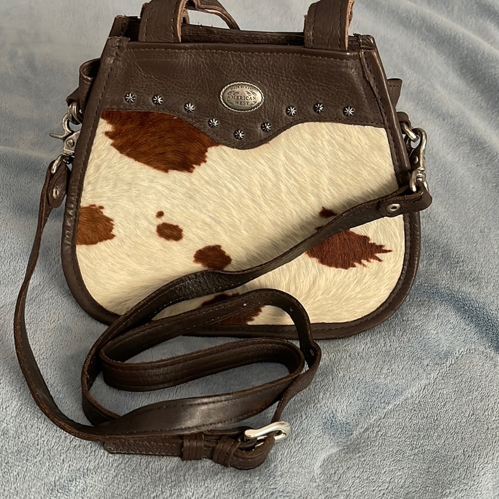 Vintage American West cowhide crossbody bag. Excellent condition. Real leather.